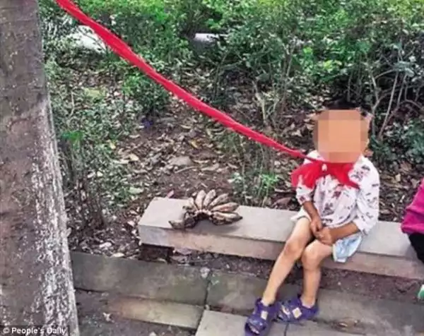 Photos: For being too naughty, this 4 year-old boy was tied to a tree by his family
